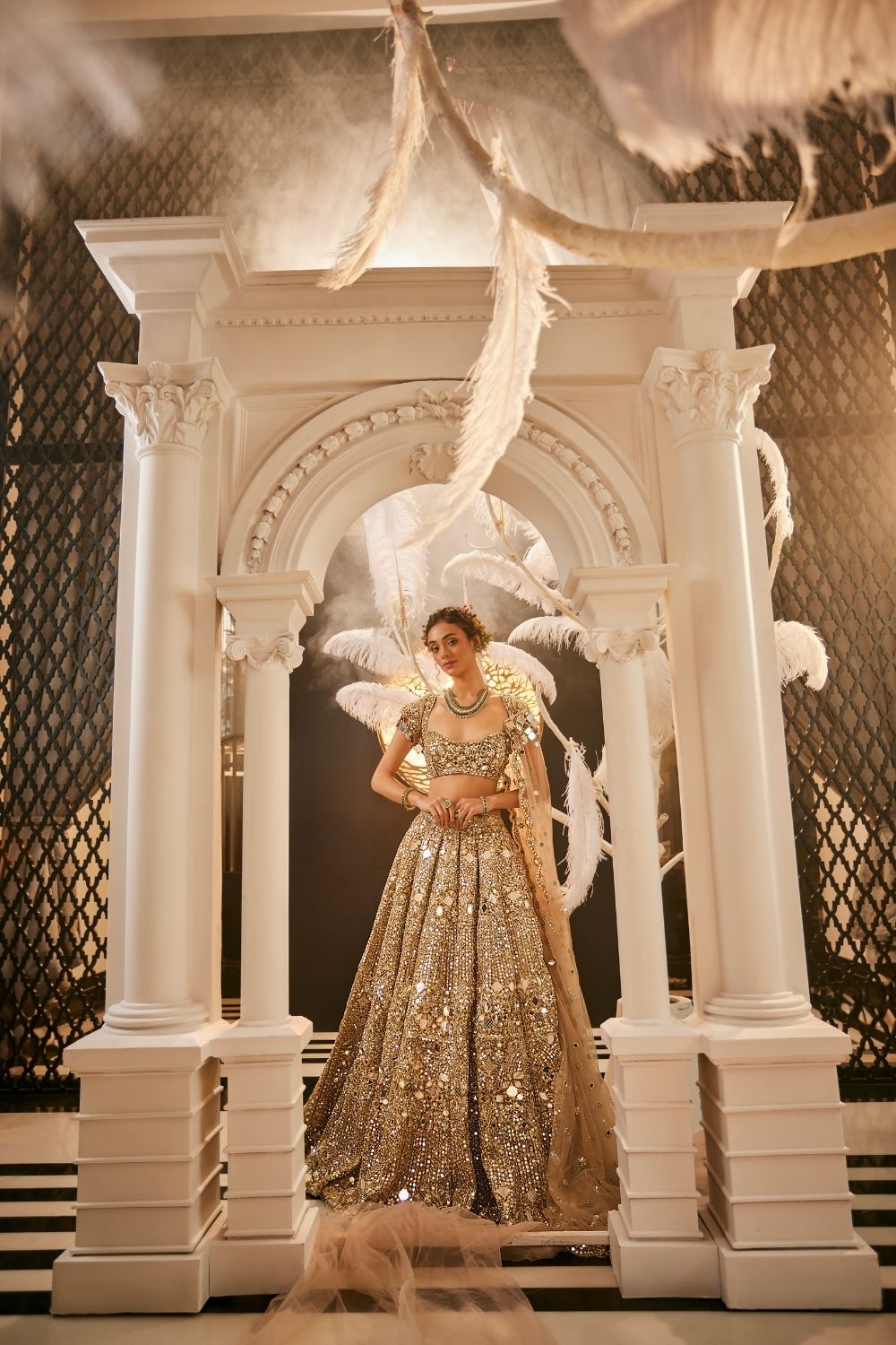 Minerva Gold Embellished Net Lehenga and Blouse with Trail