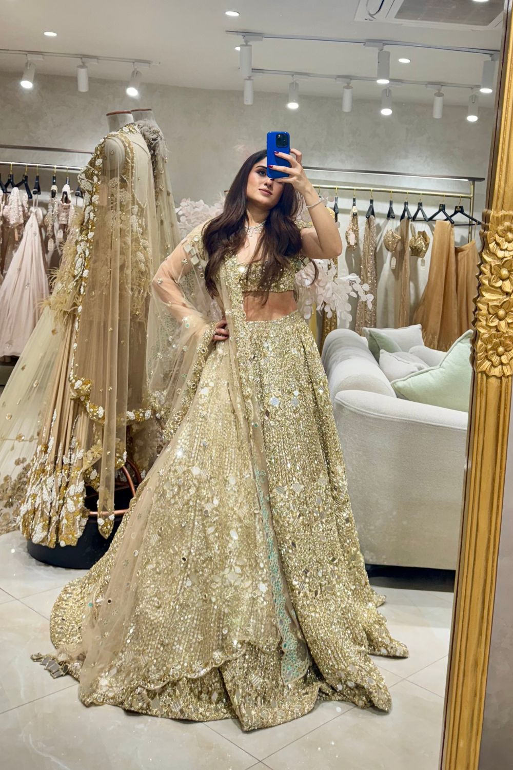 Nikita Vasdev in Minerva Gold Embellished Net Lehenga and Blouse with Trail