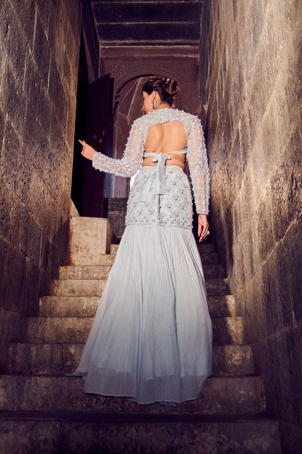 Saphir Powder Blue Embellished Net and Crepe Fish Cut Lehenga and Blouse