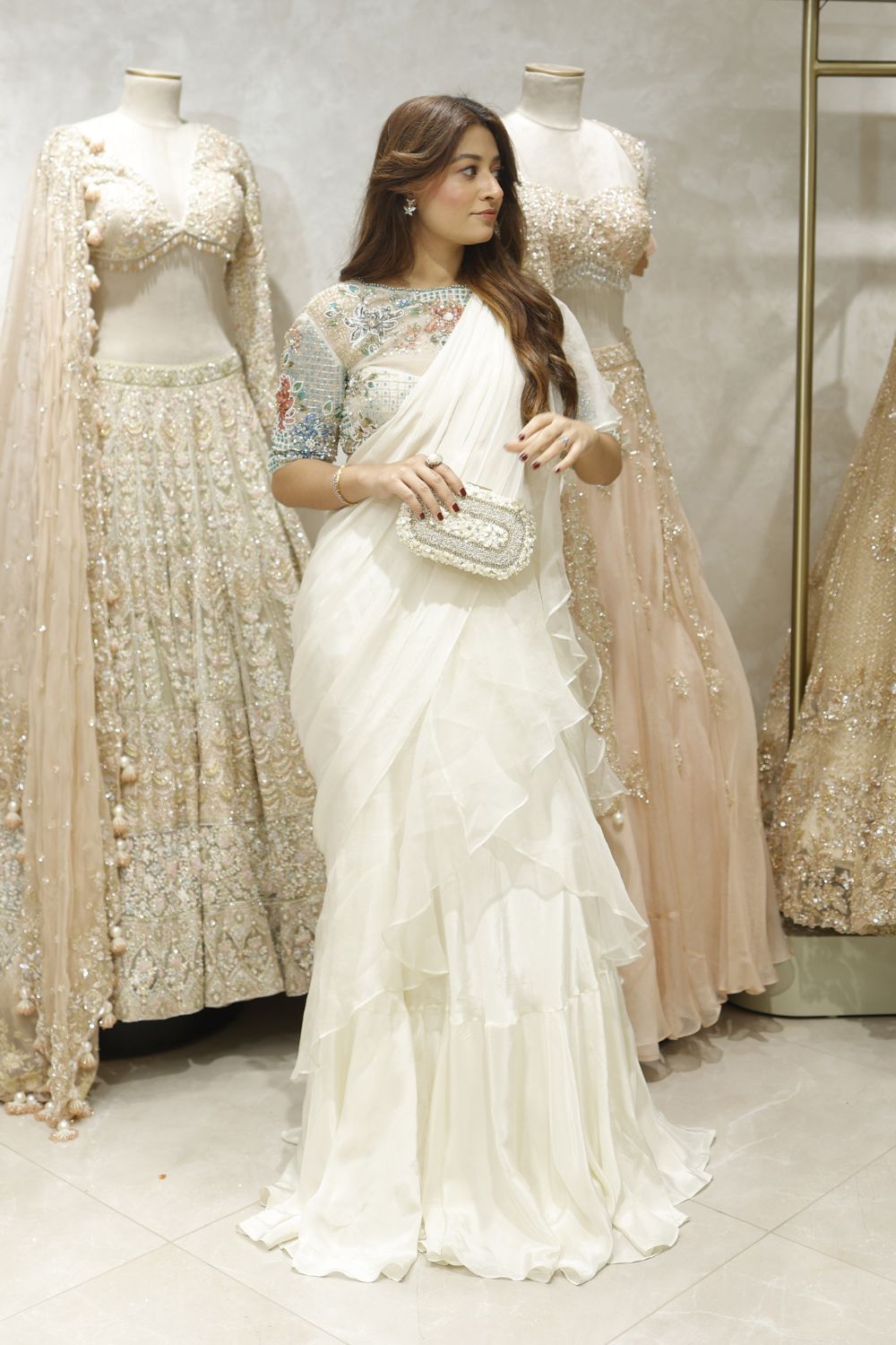 Ritika Bhandari in Meera Ivory Crepe Embellished Sequin Solid Pre-Draped Ruffle Saree With Blouse