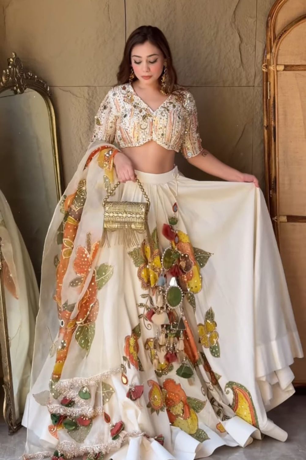 Ankita Arora in Shehnaaz Ivory Kora Organza Cutdana Embellishment & Embroidered Lehenga Set