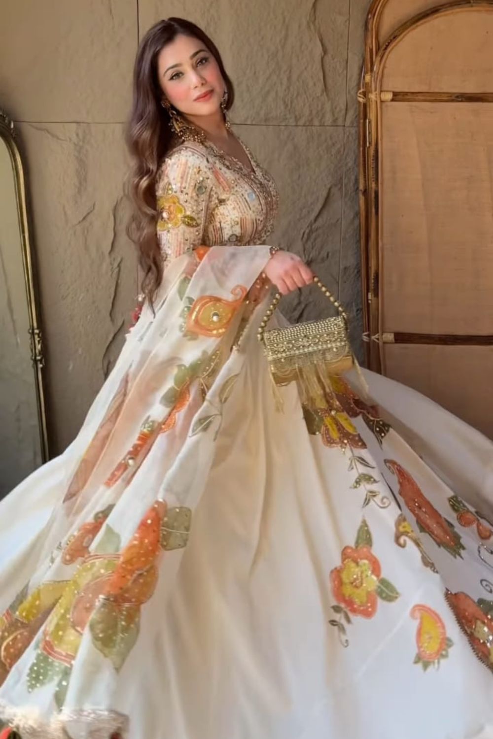 Ankita Arora in Shehnaaz Ivory Kora Organza Cutdana Embellishment & Embroidered Lehenga Set