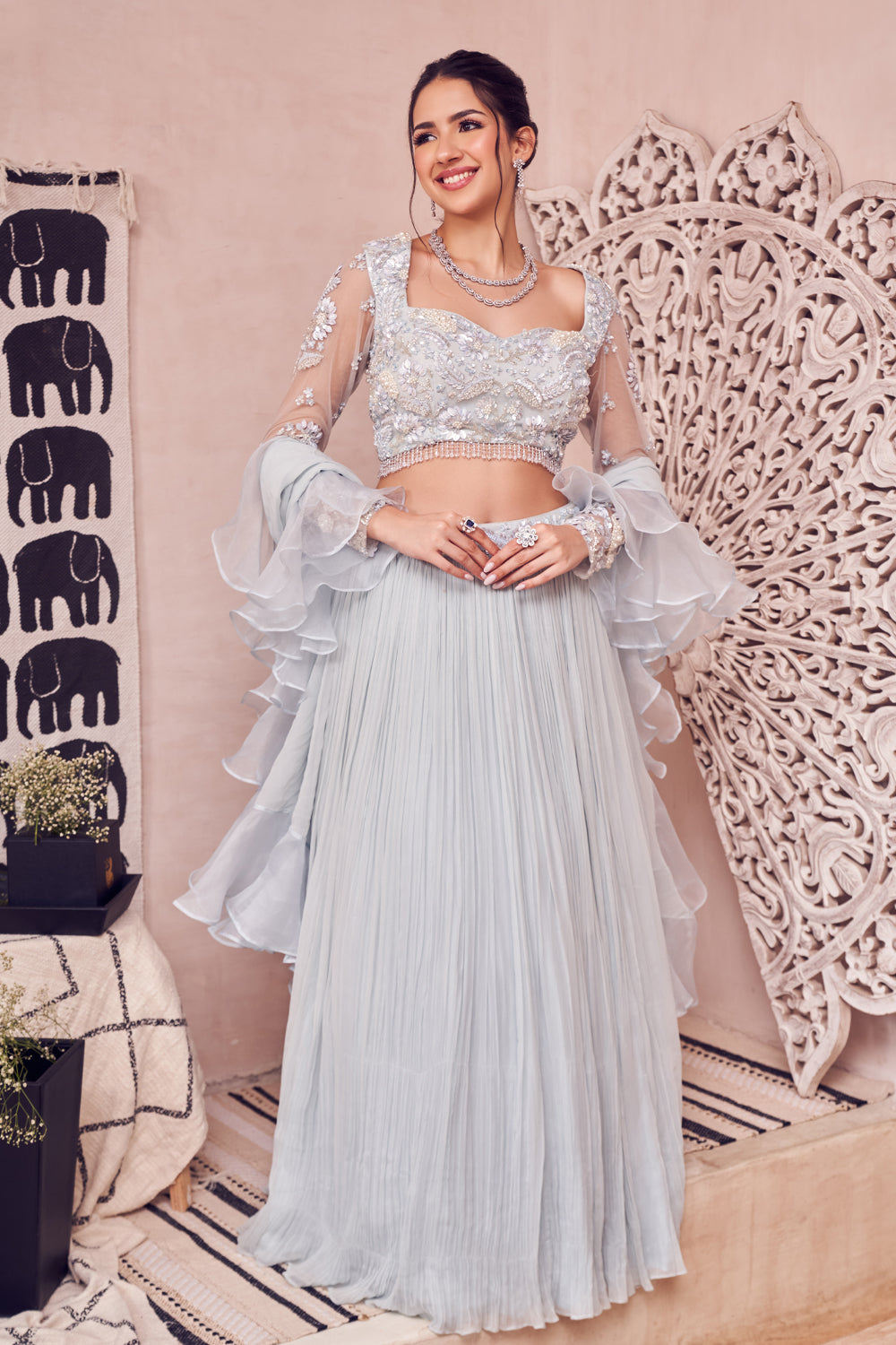 Heavenly Hue Blue Net Hand Embellished Pearls Sweetheart Lehenga Set