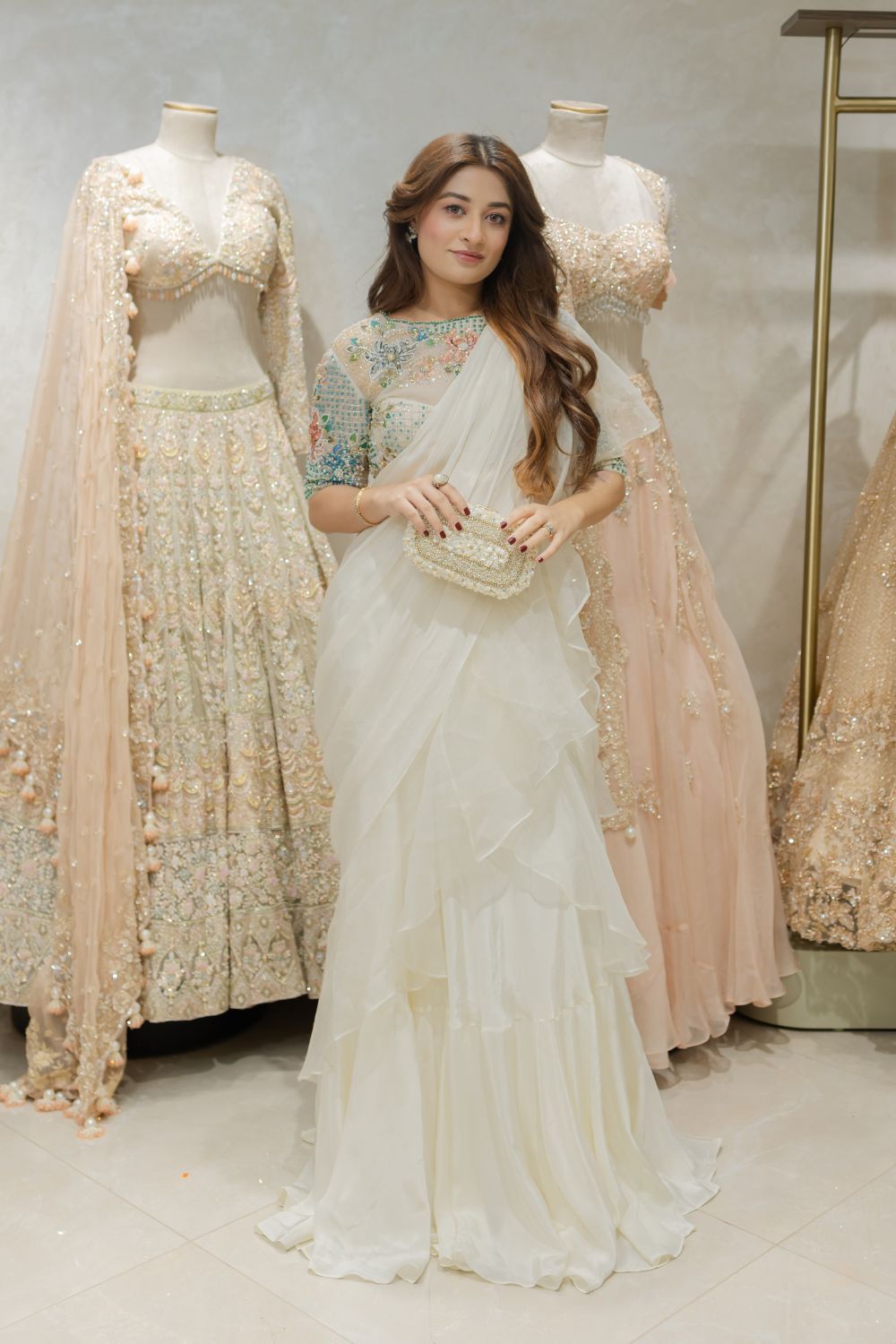 Ritika Bhandari in Meera Ivory Crepe Embellished Sequin Solid Pre-Draped Ruffle Saree With Blouse