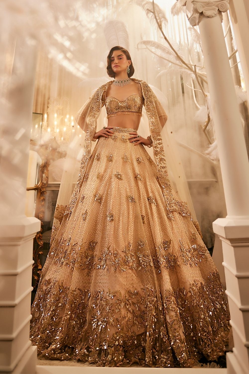 Nike Ivory Embellished Net Lehenga and Blouse with Dupatta
