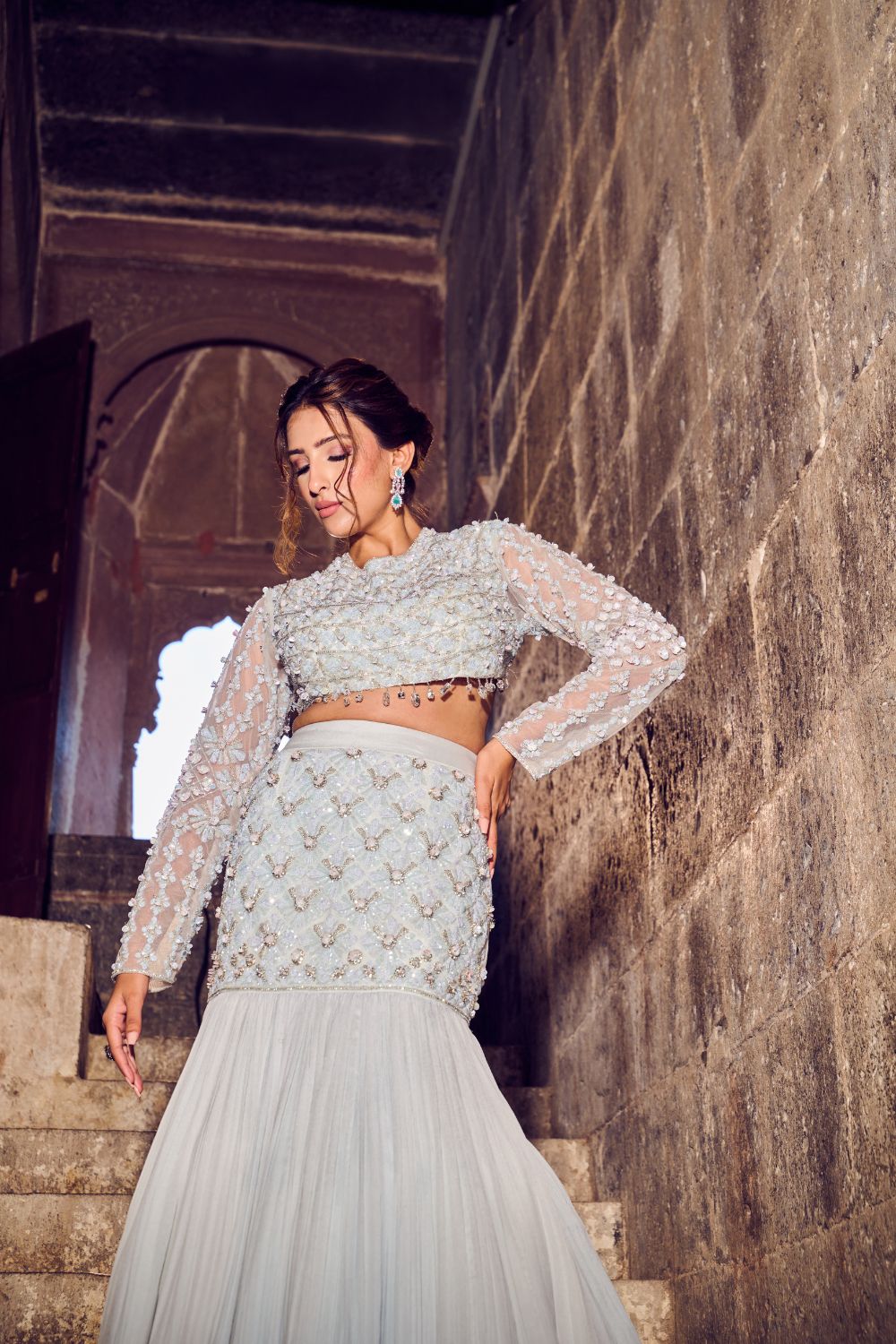 Saphir Powder Blue Embellished Net and Crepe Fish Cut Lehenga and Blouse