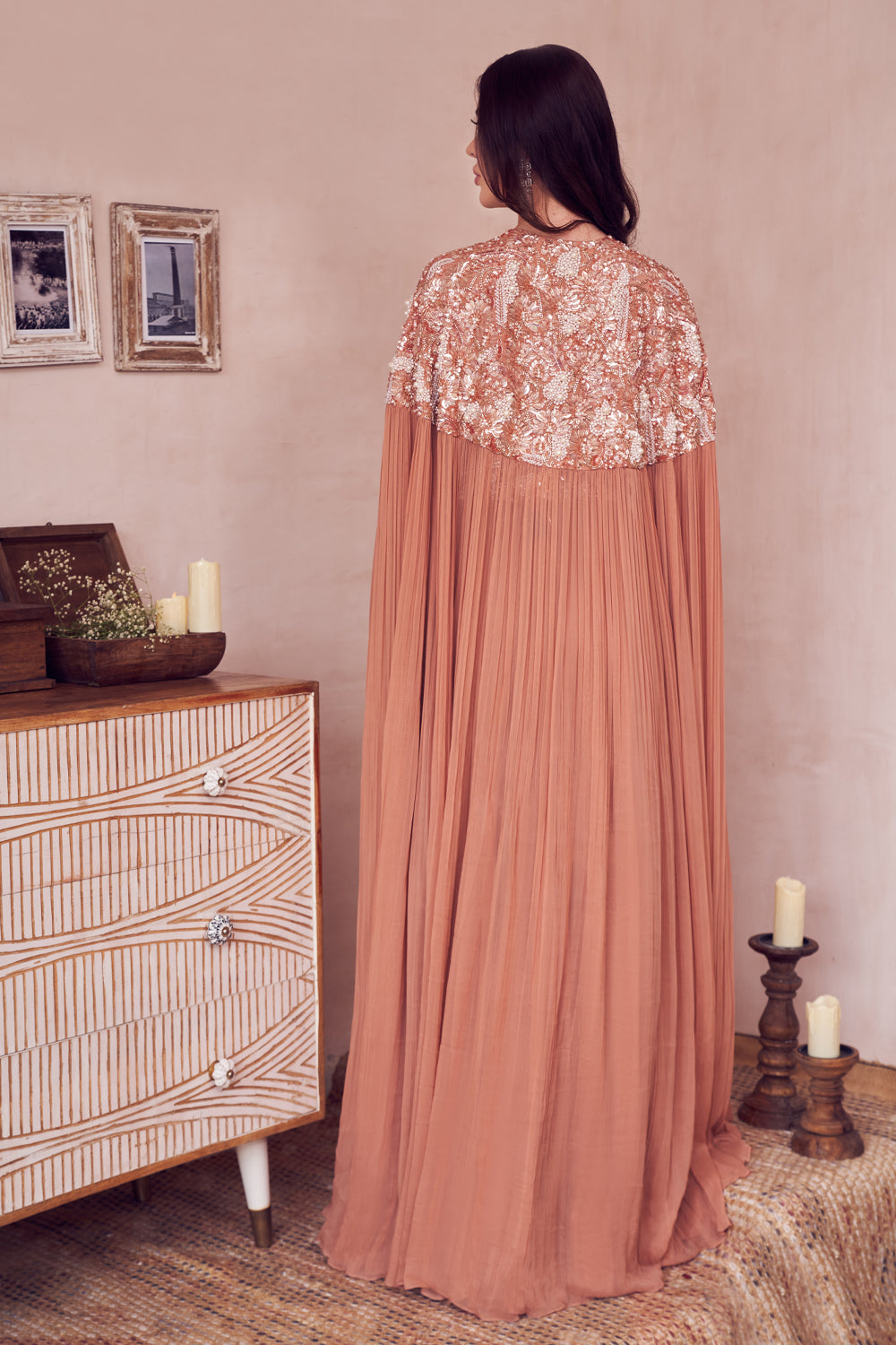 Evening Skies Rose Gold Georgette Embellished Pearl Sweetheart Gown With Cape