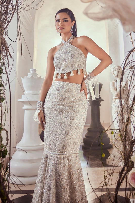 Camilla Ivory Hand Embellished Net Fish-cut Lehenga Set with Halter Neckline