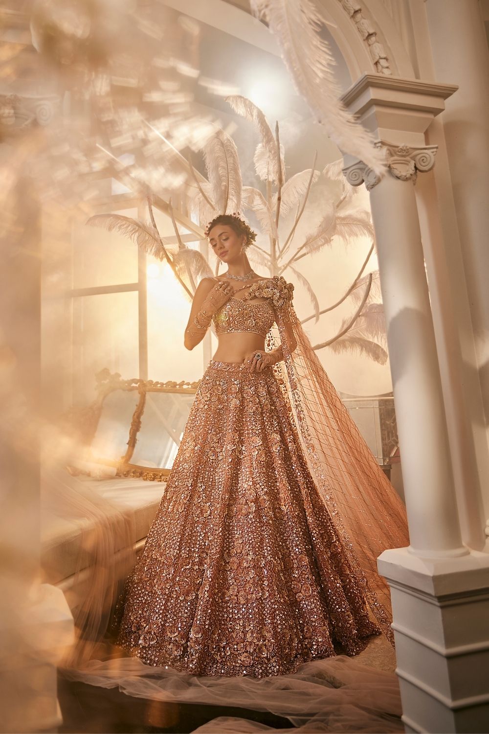 Iris Rose Gold Embellished Net Lehenga and Asymmetrical Blouse with Trail