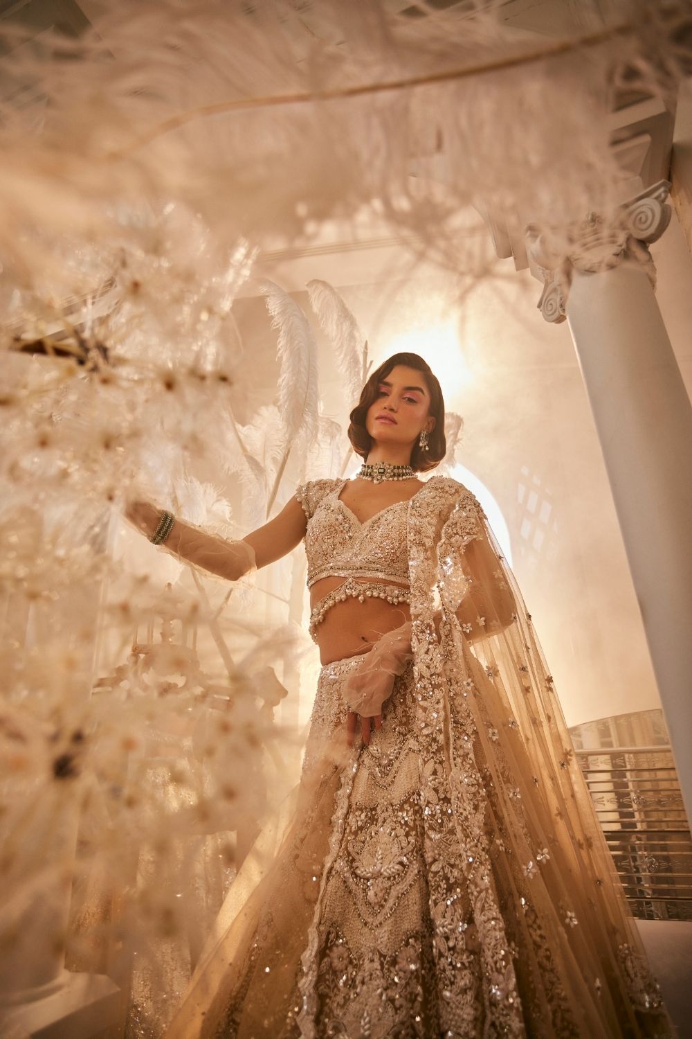 Athena Nude Embellished Net Lehenga and Blouse with Two Dupattas