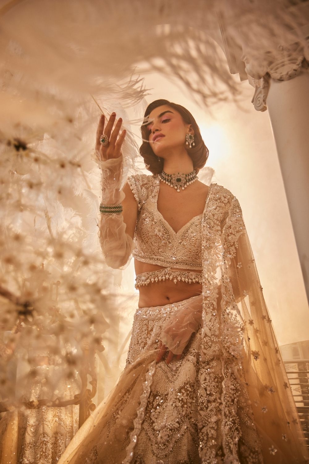 Athena Nude Embellished Net Lehenga and Blouse with Two Dupattas