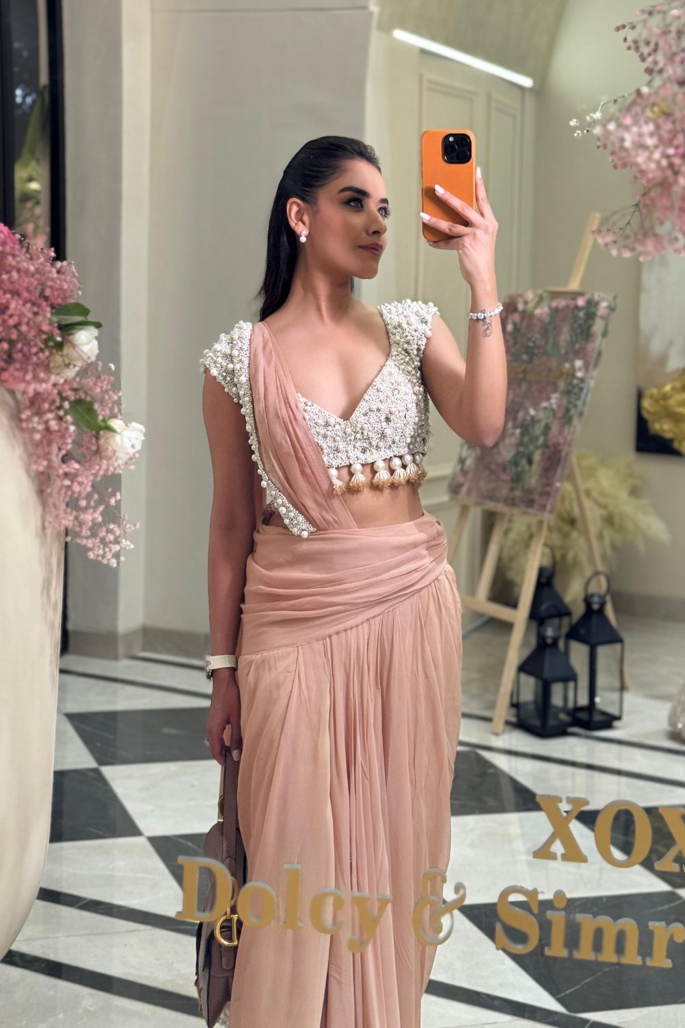 Shivani Girdhar in Pre-Draped Rose Gold Saree with Embellished Blouse