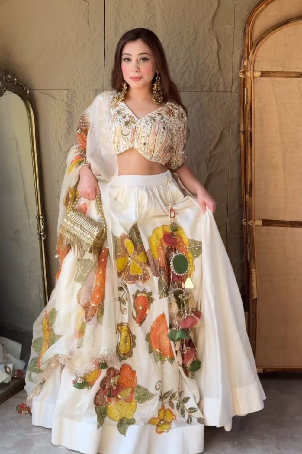 Ankita Arora in Shehnaaz Ivory Kora Organza Cutdana Embellishment & Embroidered Lehenga Set